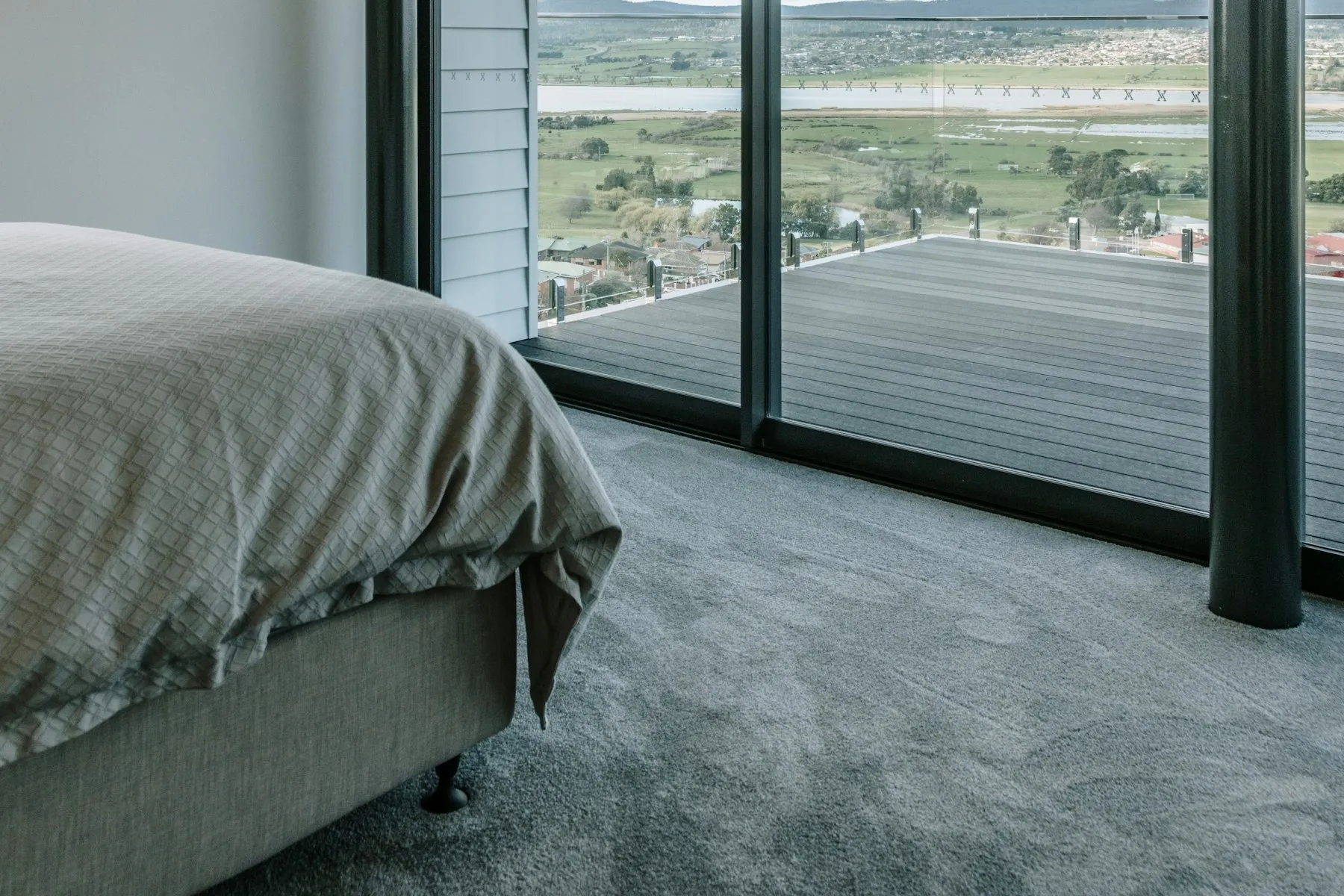 The principal bedroom, with sliding glass doors onto the terrace